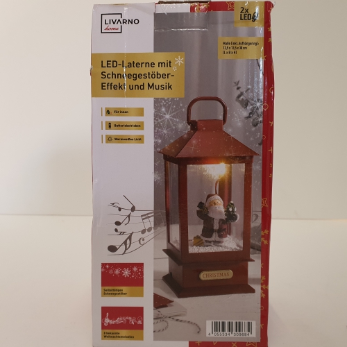 DE LED-lantaarn met sneeuwvlokeffect en muziek